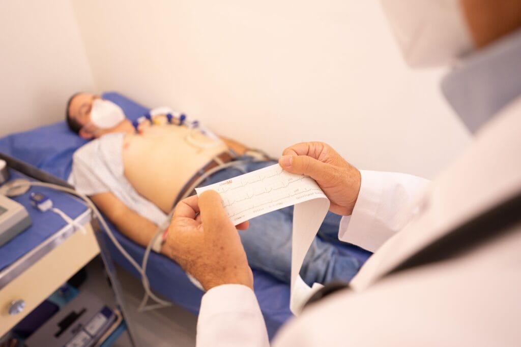 ECG assessment during private cardiology review for chest pain.